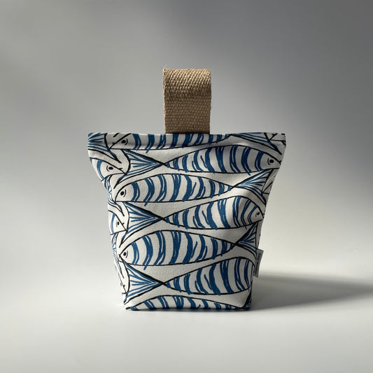 Sardine Fish White, Blue and Black Fabric Doorstop with thick jute handle on top.