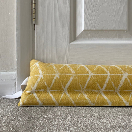 Ochre Geometric Weighed Draught Excluder - katywebsterhomeware