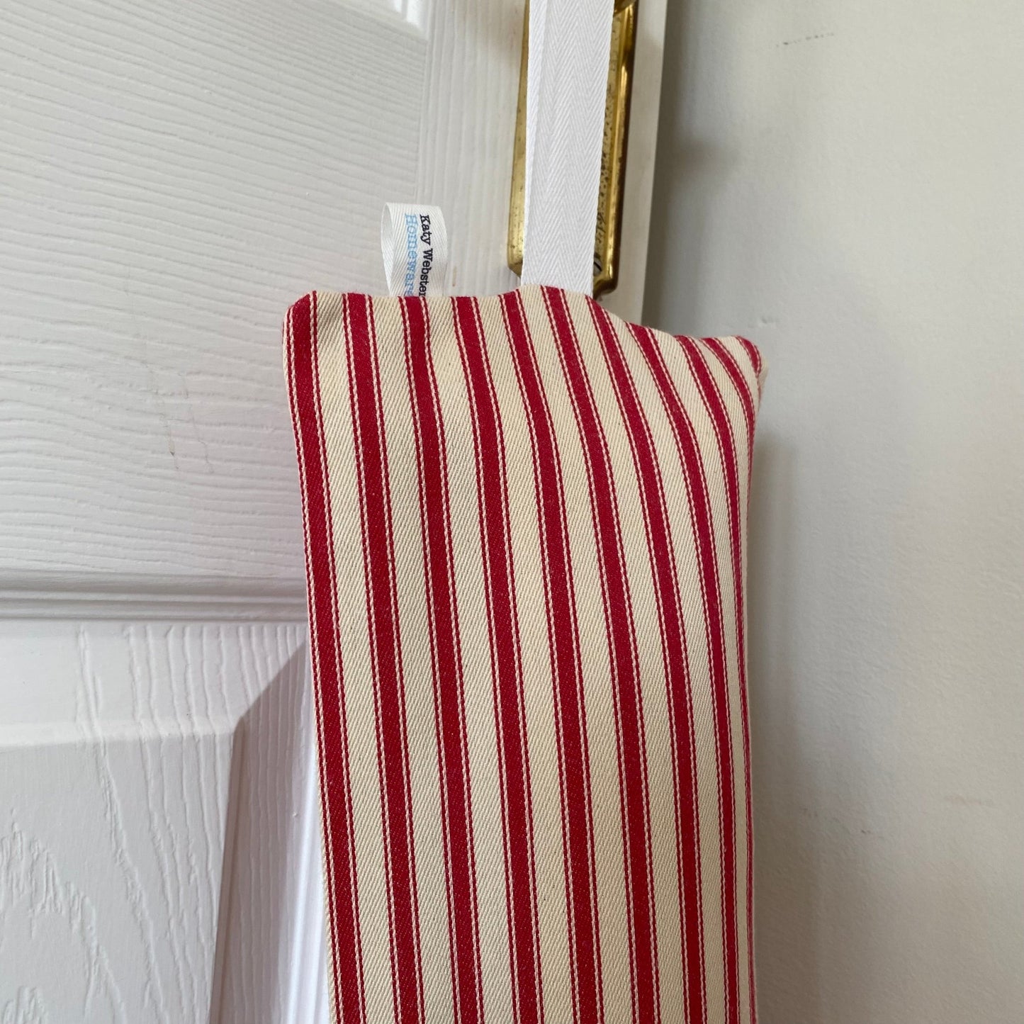 Raspberry Ticking Stripe Weighted Draught Excluder - katywebsterhomeware