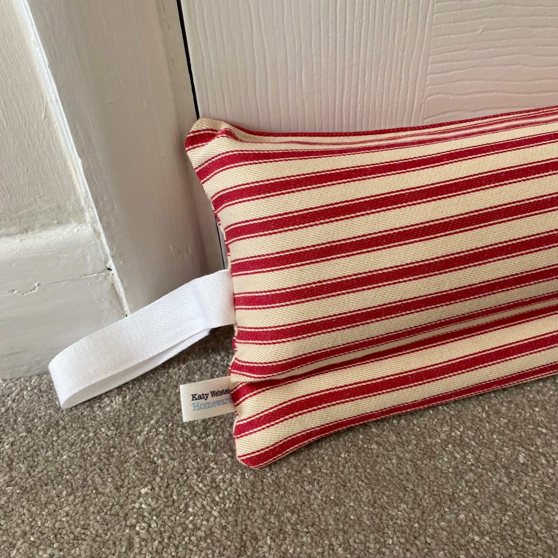 Raspberry Ticking Stripe Weighted Draught Excluder - katywebsterhomeware