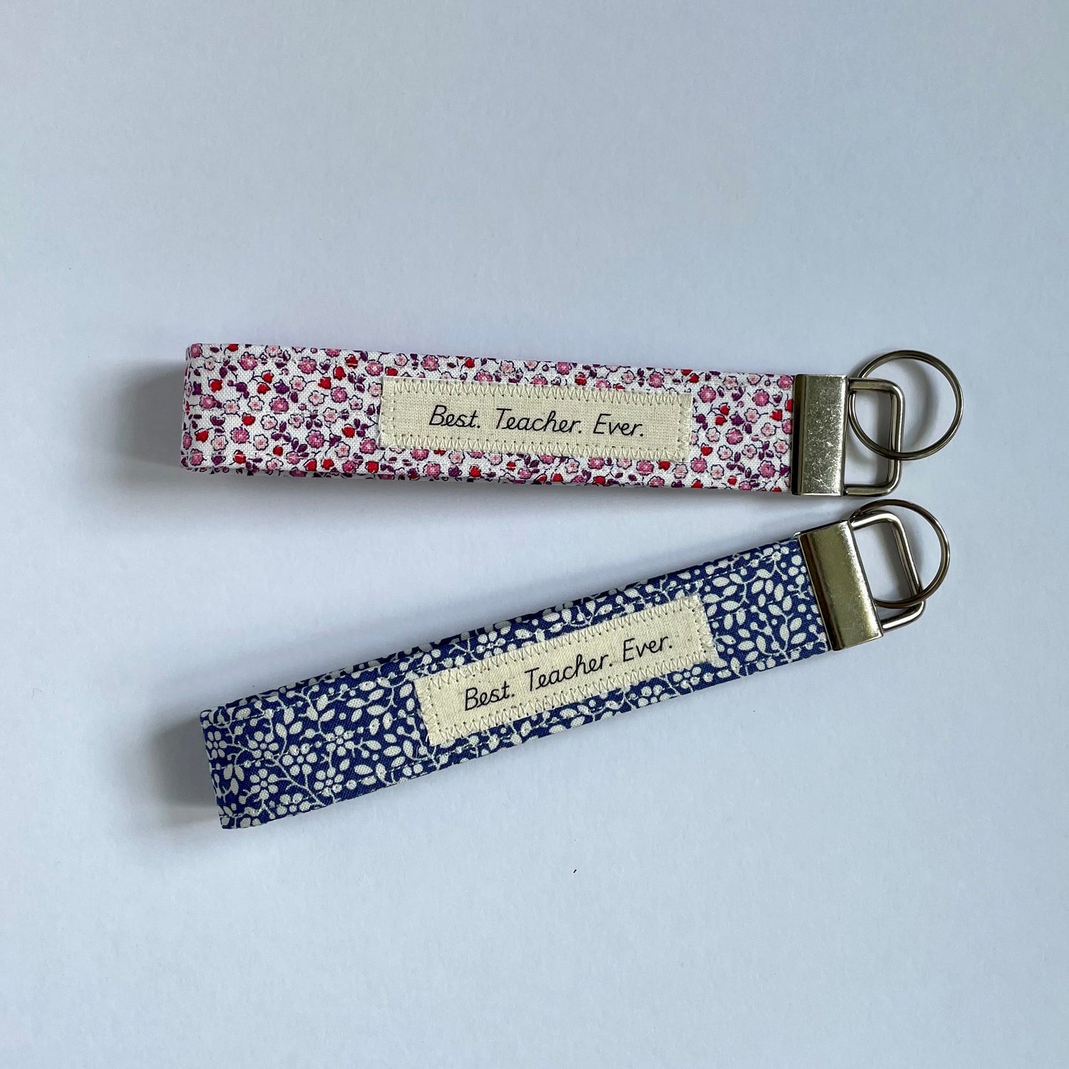 Liberty pink/purple and blue ditsy floral fabric wristlet key fobs with Best Teacher Ever applique