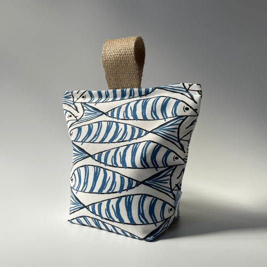 Maritime Fabric Doorstop with thick jute handle on top.