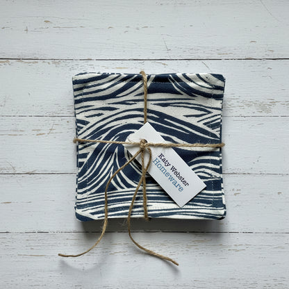 Navy sea surf print coasters tied with twine.