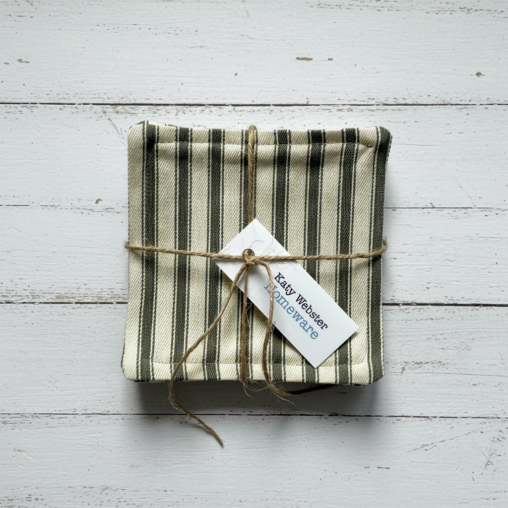 Striped fabric coasters tied with twine.
