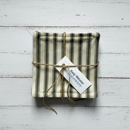 Striped fabric coasters tied with twine.