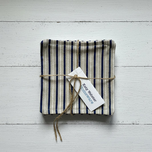 Striped fabric coasters tied with twine