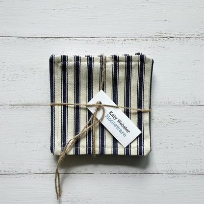 Striped fabric coasters tied with twine