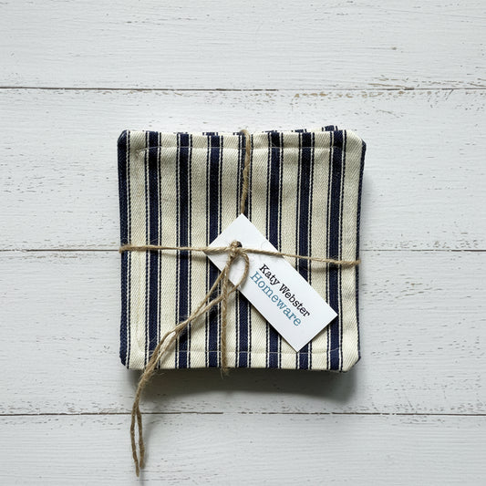 Striped fabric coasters tied with twine